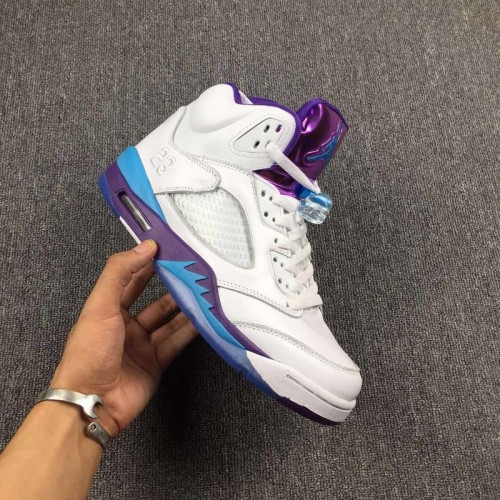 white purple and turquoise jordans